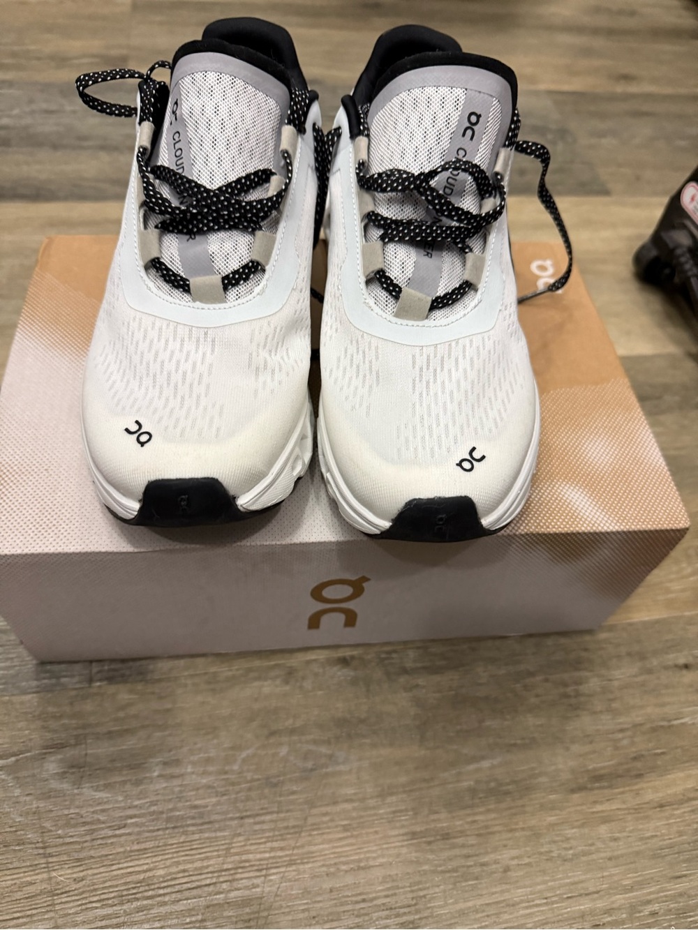 On Running Women’s White and Black Cloud Sneakers